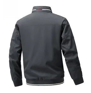 Rear view of dark grey men's standing collar jacket with red white blue striped trim