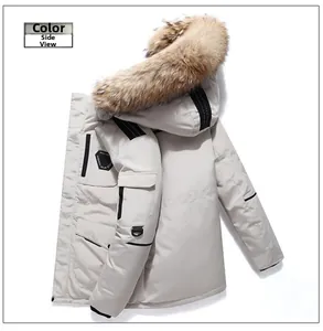 Detail view of cream parka with a fluffy brown fur collar and black sleeve stripes