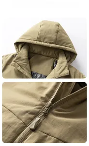 Detail view of khaki hooded jacket showing star pattern lining and premium zipper closure