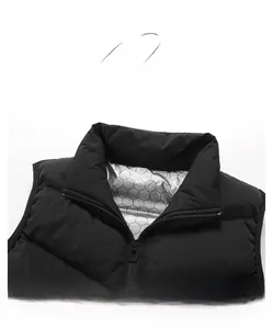 Detail of silver honeycomb thermal reflective lining and stand-up collar of black vest