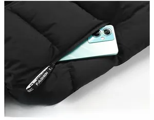 Detail shot of a men's vest waterproof fabric featuring a functional zippered side pocket