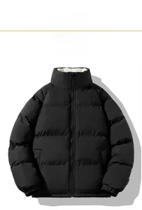 Detail view of the black stand collar winter jacket with white warm fleece lining texture
