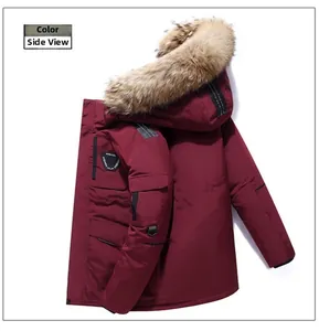 Detail of burgundy winter parka featuring a large fluffy fur collar and sleeve badge