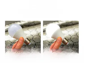 Graphene fabric insulation test showing light activation on black honeycomb texture