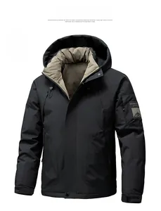 Detail view of black winter jacket sleeve with utility pocket and adjustable velcro cuff