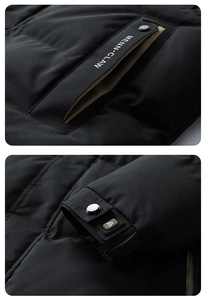 Close-up of winter jacket featuring MENN-CLAW logo print and adjustable snap cuffs