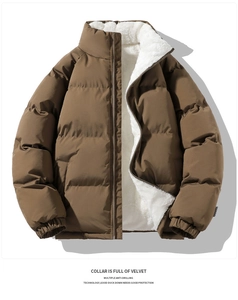 Detail of a brown padded jacket showing the soft white fleece lining and the high collar
