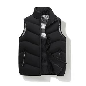 Men's black puffer vest with stand collar, heat-reflective lining, and quilted waterproof shell
