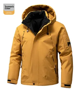Detail of turmeric winter jacket featuring adjustable hood and arm patch badge