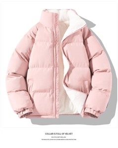 Detail of light pink padded jacket showing white lamb wool collar and zip closure texture
