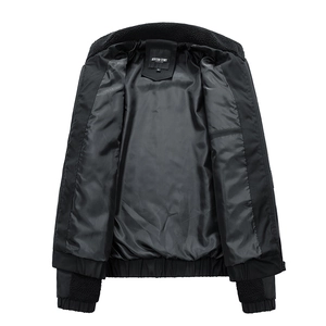 Detail of black men's fleece-lined jacket showing soft lambswool collar and smooth inner lining