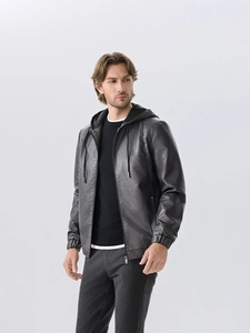 Men's minimalist black PU leather hooded jacket with drawstring and zipper closure