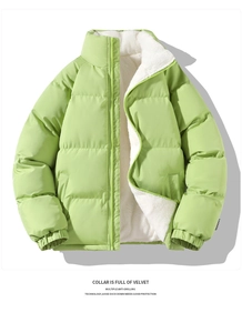 Close-up of light green winter jacket with white faux shearling collar and zipper detail