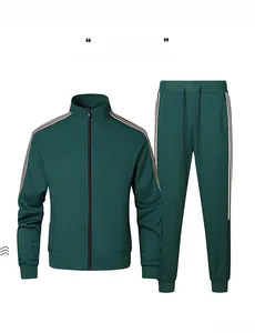 Close-up of deep green tracksuit with white side stripes and ribbed standing collar
