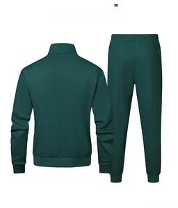 Back view of a deep green men's athletic tracksuit with stand collar jacket and jogger pants