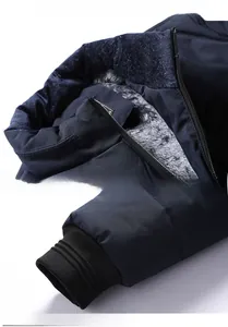 Detail view of the warm fleece-lined collar and ribbed elastic cuffs of the men's winter jacket