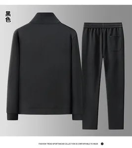 Rear flat lay view of a black men's sports tracksuit with ribbed cuffs and elastic waistband