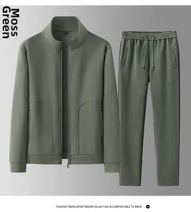 Flat lay of moss green men's tracksuit set featuring stand-collar jacket and drawstring pants