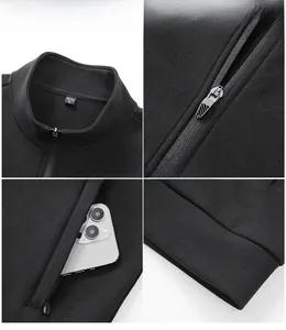 Detail view of black zip-up sports jacket featuring stand collar and functional pockets