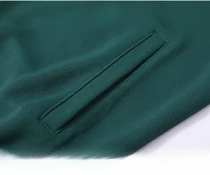 Detail of dark green sportswear side pocket with high-quality ribbed knit fabric texture