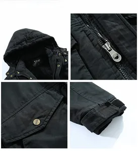 Detail of men's hooded work jacket with metal zippers, classic buttons and velcro cuffs