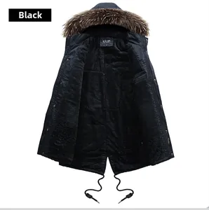 Detail of black hooded parka featuring thick brown faux fur trim and warm fleece lining
