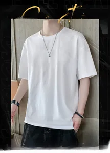 Close-up of a white cotton crew neck T-shirt showing fabric texture and drop shoulder detail