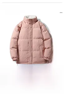 Detail of light pink winter puffer jacket with warm fleece lining and adjustable hem