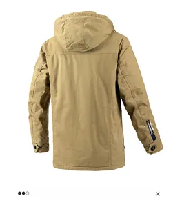Detail view of khaki hooded parka back showing decorative printed sleeve webbing