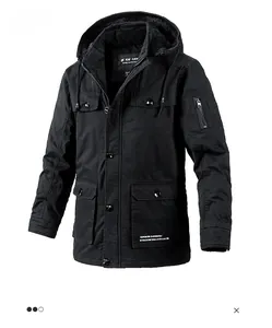 Close-up detail of a men's black hooded winter parka with multi-pockets and drawstring