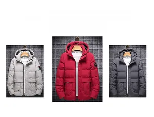 Men's hooded winter coat in grey and red colors with ribbed cuffs and utility pockets