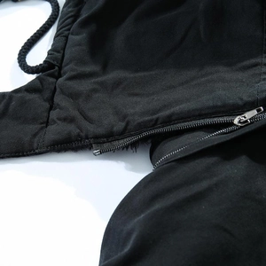 Men's thermal winter jacket detail featuring silver metal zipper and black drawstrings