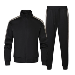 Men's black athletic two-piece tracksuit with iconic three-stripe detail on jacket and pants