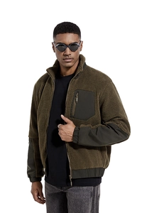 Detail of olive green lamb wool jacket with contrast zipper pocket and stand collar