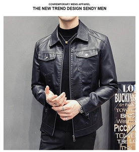 Detail of black slim fit faux leather jacket featuring lapel collar and chest pockets