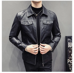 Detail view of slim fit black faux leather biker jacket with lapel collar and flap pockets