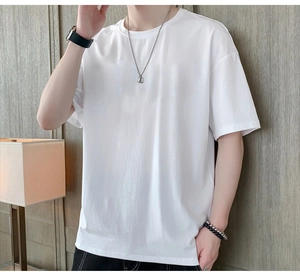 Front view of a men white crew neck cotton T-shirt featuring a relaxed drop shoulder fit