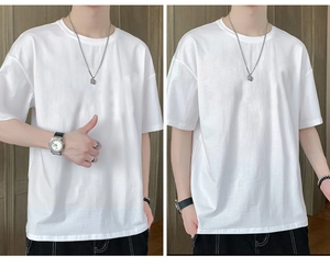Detail of loose-fit men's white short-sleeve T-shirt with premium cotton texture