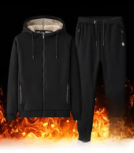 Close-up of black hooded tracksuit with thick lamb wool lining for thermal warmth