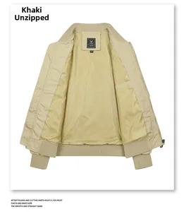 Flat lay of khaki flight jacket showing smooth yellow lining and internal pocket detail