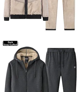 Detail of dark grey fleece hoodie and joggers showing thick lamb wool lining and zipper pocket