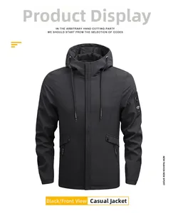 Detailed view of black hooded jacket featuring a metal zipper and rectangle sleeve patch