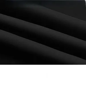 Macro detail of high-quality black twill fabric with windproof functional texture