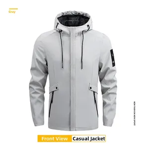 Detail of grey hooded jacket featuring drawstring hood and logo patch on sleeve