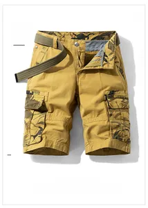 Detailed flat lay of khaki cargo shorts with camo accents and green webbing belt included