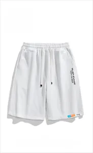 Close-up of white waffle texture fabric and elastic drawstring waist for casual shorts
