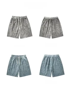 Vues détaillées du short gaufré gris et bleu avec une finition délavée à l'acide rétro