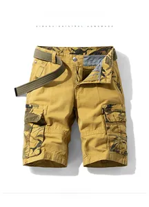 Detail of khaki cargo shorts with camouflage inner waistband and woven canvas belt