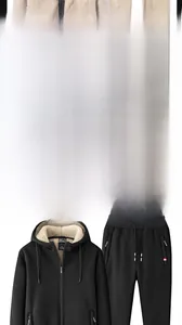 Detailed view of thick lamb fleece lining on heavyweight hooded sweatshirts and pants set