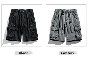 Detail view of cargo shorts in black and light grey with multiple utility pockets